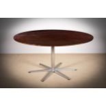 A CIRCULAR 6 STAR SERIES DINING TABLE