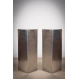 A PAIR OF BRUSHED STEEL PEDESTALS