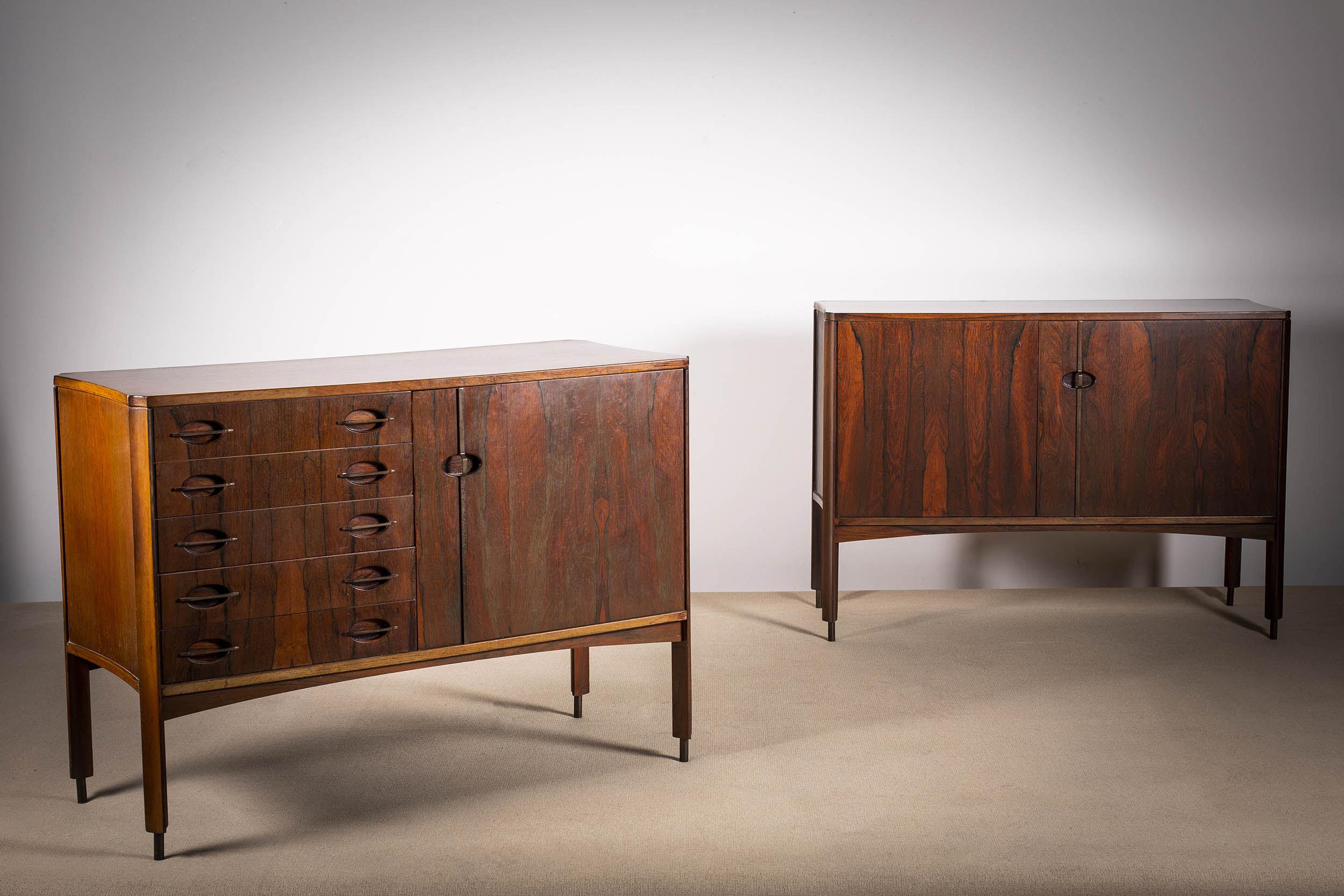 A ROSEWOOD SUITE OF CABINETS