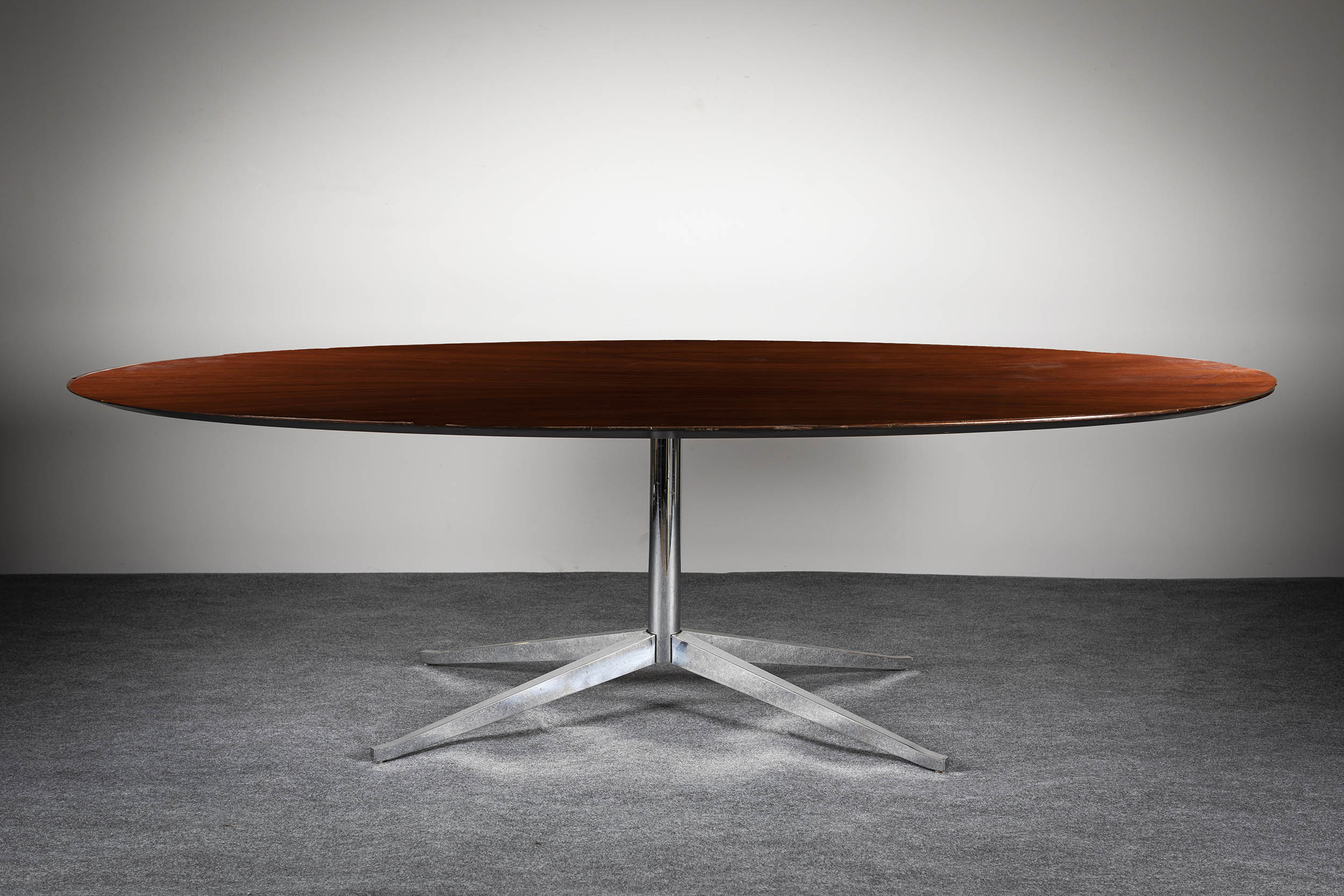 A FINE OVAL 96 TABLE, ATTRIBUTED TO FLORENCE KNOLL, 1960s, on chromed steel base, 244cm x 137cm x