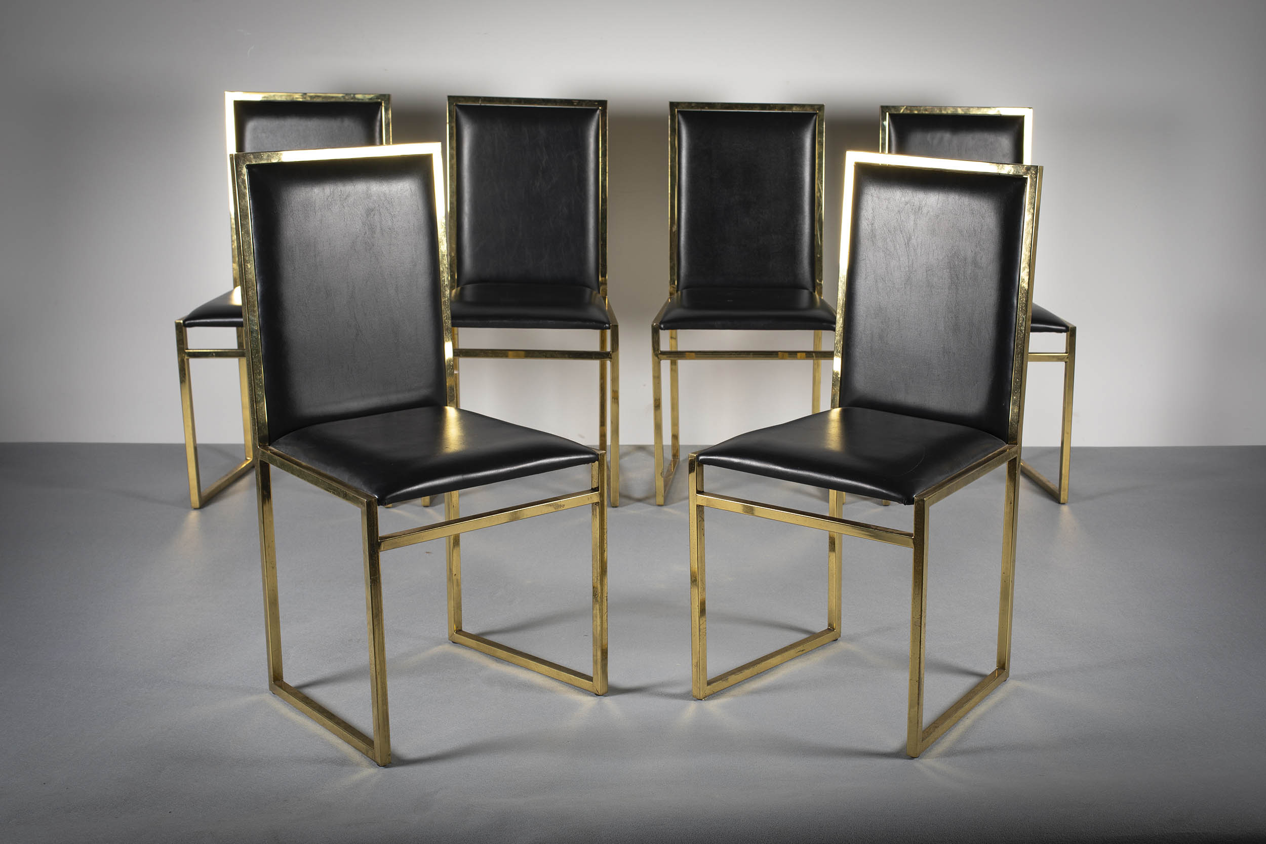 A SET OF SIX LEATHER AND GILT METAL FRAMED DINING CHAIRS, FRENCH 1970s (6)