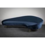 A CONTEMPORARY VELVET UPHOLSTERED CRESCENT SHAPED SOFA, ITALIAN, in the manner of Ico Parisi, on