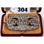 A FINE ART DECO PERIOD 18CT WHITE GOLD PLAQUE BROOCH set with diamonds, the pin with trombone catch,