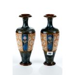 A PAIR OF LATE 19TH/EARLY 20TH CENTURY ROYAL DOULTON STONEWARE VASES, marbled blue/green ground with