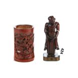 AN 18TH CENTURY CHINESE BAMBOO CARVING OF A BUDDHIST MONK, raised on a canted corner base, 6 1/2 ins