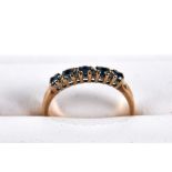 A 9CT YELLOW GOLD HALF HOOP SAPPHIRE AND DIAMOND ETERNITY RING, size P 1/2, stamped 375,