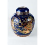 A 20TH CENTURY CARLTON WARE BLUE GROUND OVOID JAR AND COVER decorated in polychrome enamels and gilt