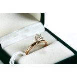 A LADY'S 14K YELLOW GOLD MARQUISE CUT SOLITAIRE DIAMOND RING, size M, approximately 0.70ct,