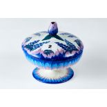 A 20TH CENTURY CARLTON WARE DELPHINIUM PATTERN PEDESTAL BOWL AND COVER with flower knop,