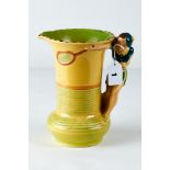 A BURLEIGH WARE YELLOW GROUND JUG with female tennis player handle, printed mark, impressed 2000,