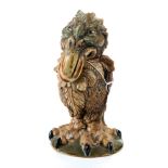 A COBRIDGE STONEWARE GROTESQUE WALLY BIRD JAR AND COVER in the martin brother's taste,