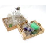 Two boxes of assorted glassware to include, claret jug, sherry glasses, green glass bowls etc.