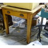 An Edwardian pine kitchen table CONDITION: Please Note - we do not make reference