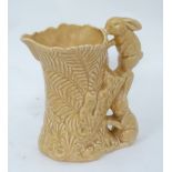 Sylvac water jug, impressed marks under, the handle formed as 2 rabbits.