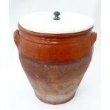 A large terracotta bread crock with painted wooden lid CONDITION: Please Note - we