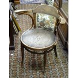 An early 20thC Bentwood circular seated open arm Chair.