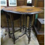 A small oak gateleg table with barley twist legs CONDITION: Please Note - we do not