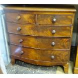 A Victorian mahogany bow fronted chest of drawers comprising 2 short over 3 graduated long drawers.