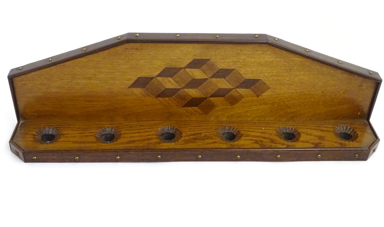 Pipe smoking: An early 20thC oak pipe rack, with provision for nine pipes, - Image 5 of 12