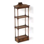 An early 20thC mahogany display stand in the form of a pagoda, having four turned supports,