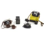 Four 20thC vintage cameras, comprising a Voigtlander 'Vitoret' 35mm (cased),