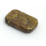 A brass vesta case with Japanese Aesthetic movement decoration depicting birds amongst reeds,
