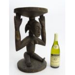 Tribal : An Ethnographic Native Tribal Luba stool supported by seated caryatid figure. Approx.