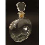 An ornate 20thC clear glass decanter with cork and shaped glass stopper ,