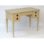 An early / mid 20thC American 'John Widdicomb' dressing table with hinged lid lifting to reveal