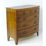 A Victorian mahogany bow fronted chest of drawers,