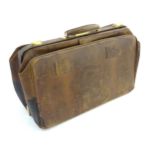 A Gentlemans large Gladstone style case with brass fitments etc opening to reveal linen and leather