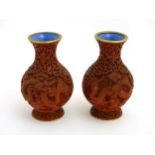 A pair of Chinese Cinnabar lacquer vases depicting 2 dragons 5" high CONDITION: