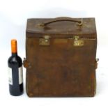 Vintage Retro: An early XX / late XIX linen lined leather case with side opening section,