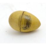 Mauchline ware : A Turned treen needlework thimble case of egg form,