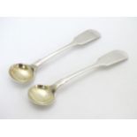 A pair of silver fiddle pattern teaspoons hallmarked Sheffield 1904 maker Henry Williamson Ltd.