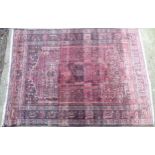 Rug carpet: A large handmade Persian rug with pale red, cream, mushroom, dark buff, etc.