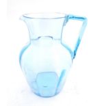 A Turquoise blue glass jug 7" high CONDITION: Please Note - we do not make