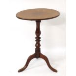An early 19thC mahogany tripod occasional table,