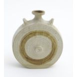 A studio pottery circular vase with stoneware glaze. Approx.