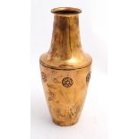 An early 20thC British Arts and Crafts copper embossed vase.
