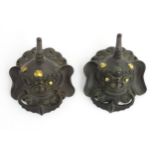 A pair of 18thC / 19thC bronze and gilded door knockers formed as mythical animals.