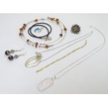 Assorted jewellery to include silver pendants,