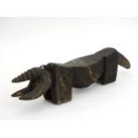 Tribal : An Ethnographic Native Tribal Kuba rubbing oracle of zoomorphic form. Approx. 20" long.