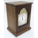 1977 Silver Jubilee Timepiece: A Walnut cased Charles Frodsham, London Silver Jubilee mantel clock,