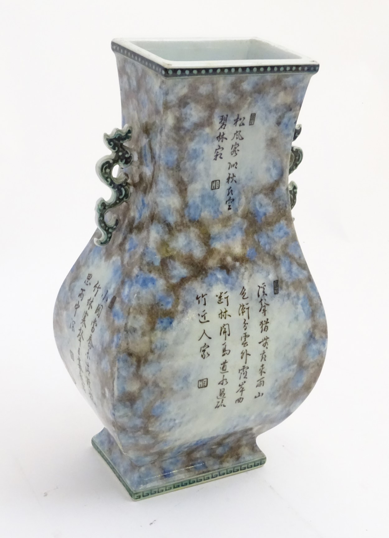 A Chinese fanghu vase with a mottled blue and grey ground and Chinese character decoration,