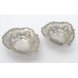 A Victorian pair of silver bon bon dishes of heart shape,
