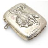 A large silver vesta case decorated with an image of a figure on horseback. Marked .925.