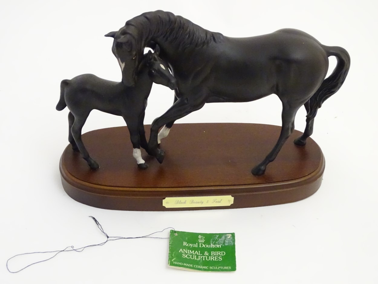 A Royal Doulton 'Black Beauty and Foal' equestrian group on a wooden plinth. Approx. - Image 7 of 7