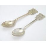 A pair of silver teaspoons hallmarked Birmingham 1977 with Silver Jubilee mark.