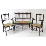 An early 20thC salon suite / cottage suite comprising settee,
